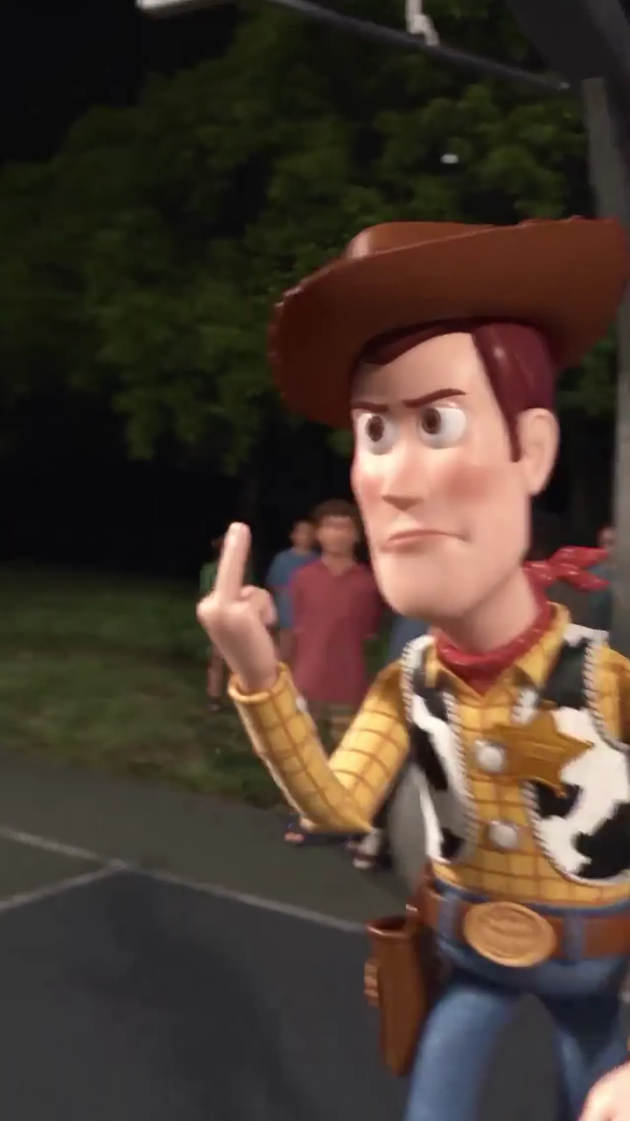 Close-up of Woody taunting the camera
