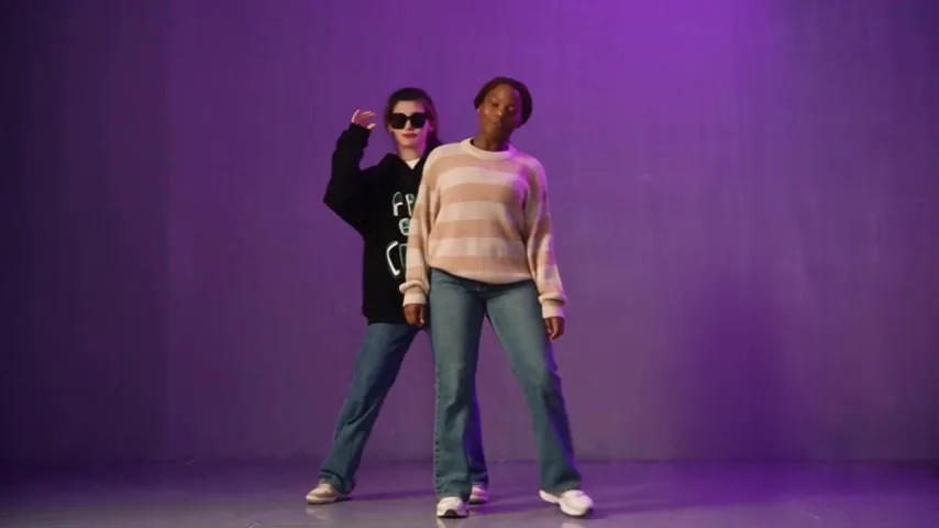 Side-by-side sway with one arm raised