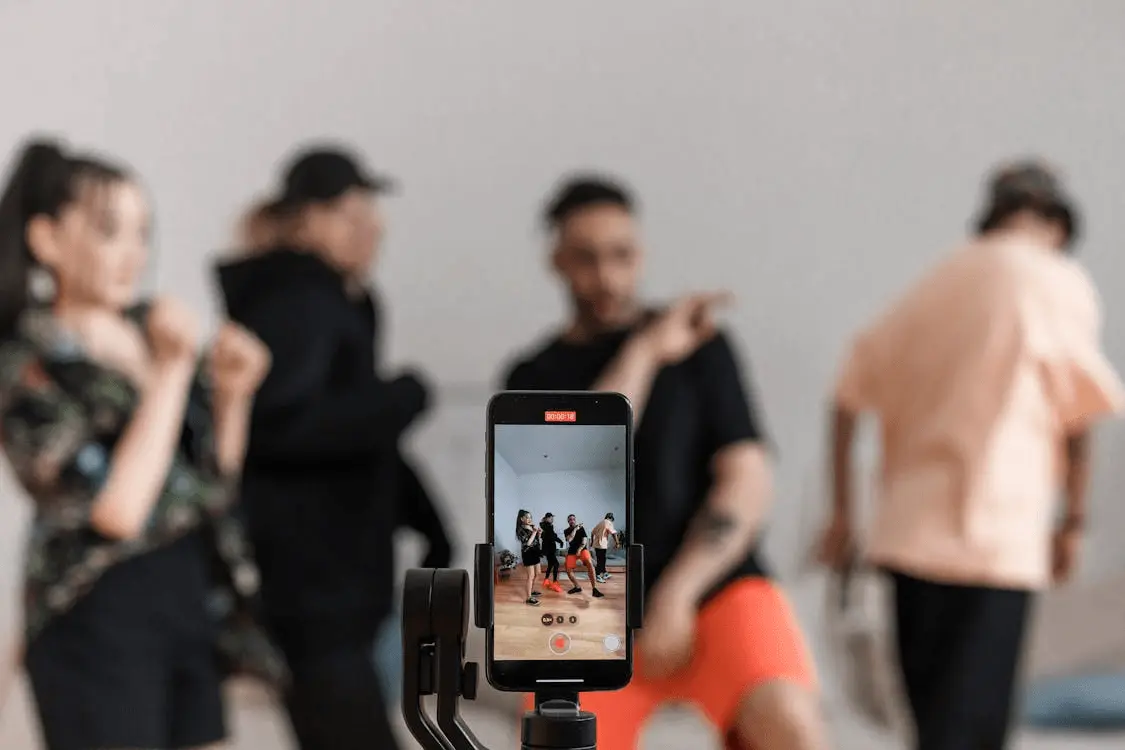 Creator filming a sketch on a phone